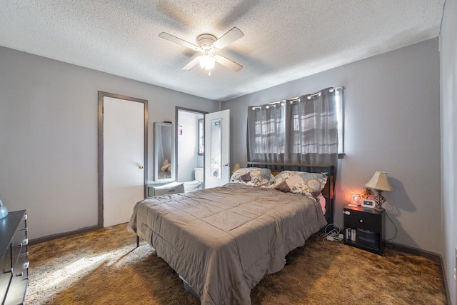 carpeted bedroom with a textured ceiling and ceiling fan