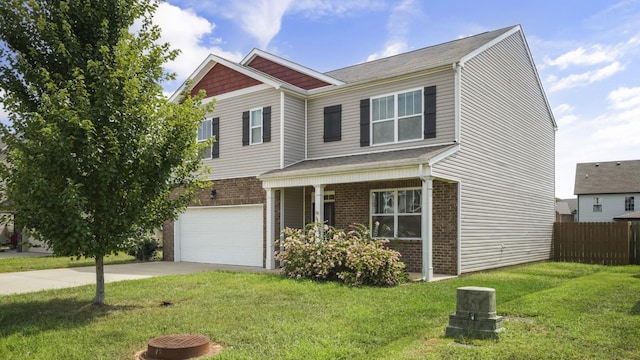 view of front of home with a garage and a front lawn