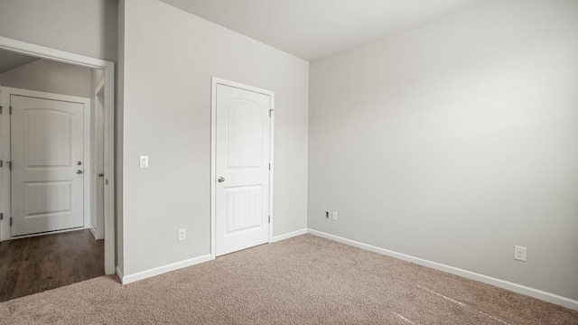 unfurnished bedroom featuring carpet