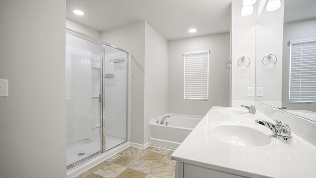 bathroom with vanity and walk in shower