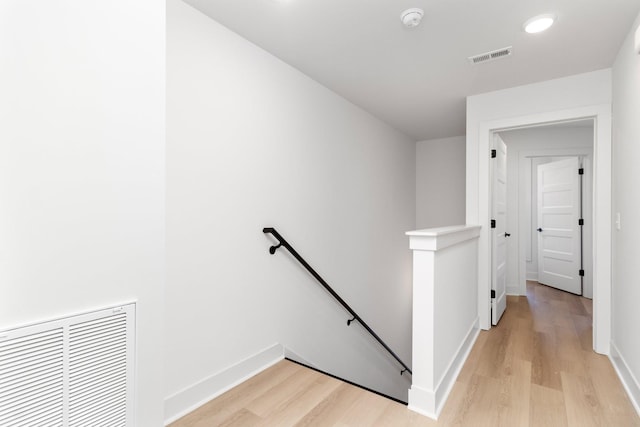 hallway featuring light hardwood / wood-style flooring