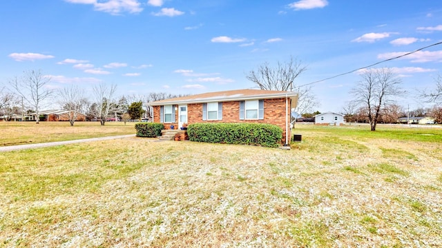 ranch-style home with a front yard