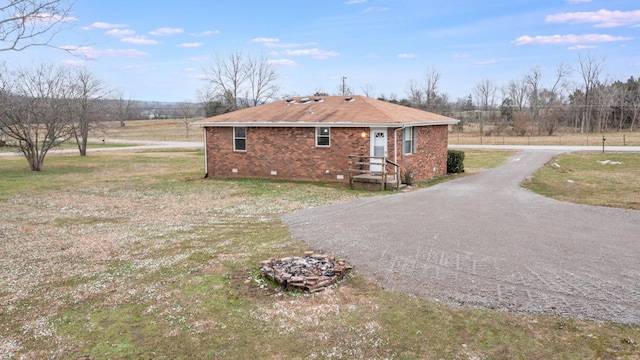 view of home's exterior featuring a yard