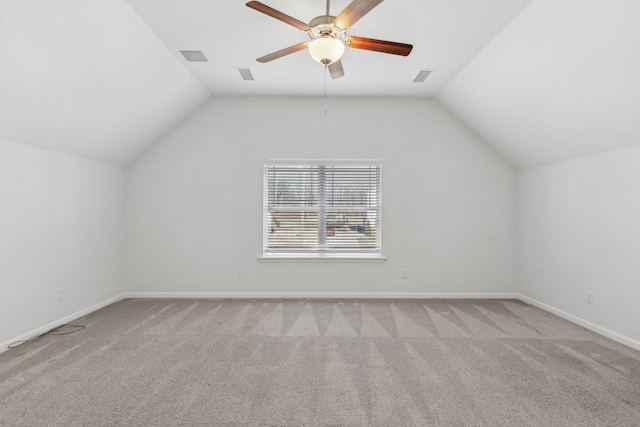 bonus room featuring light carpet, ceiling fan, and vaulted ceiling