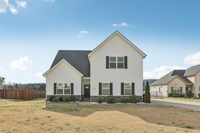 view of front facade with a front lawn