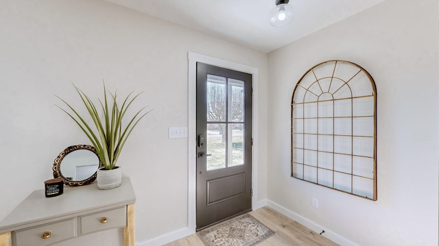 foyer with light wood-type flooring