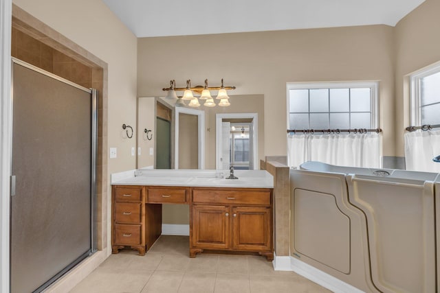 bathroom featuring vanity, tile patterned floors, and a shower with door