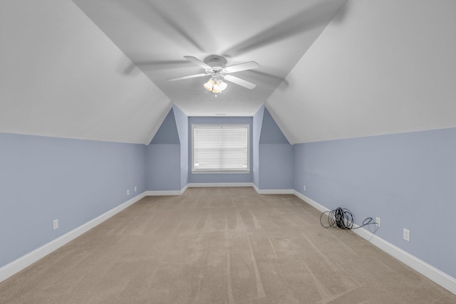 bonus room featuring light carpet, ceiling fan, and lofted ceiling