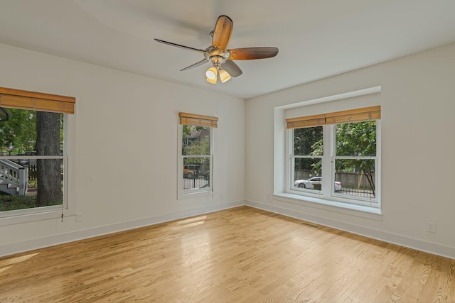 unfurnished room featuring ceiling fan and light hardwood / wood-style floors