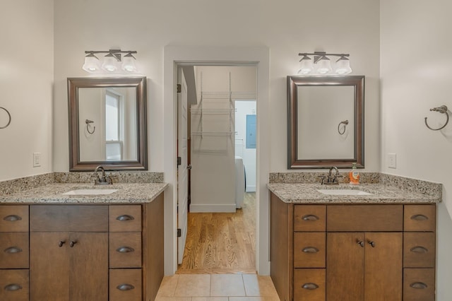 bathroom featuring tile patterned floors and vanity