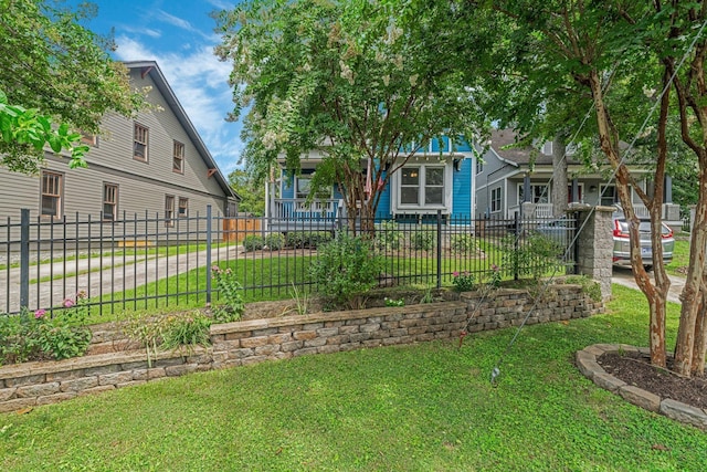 view of yard with covered porch