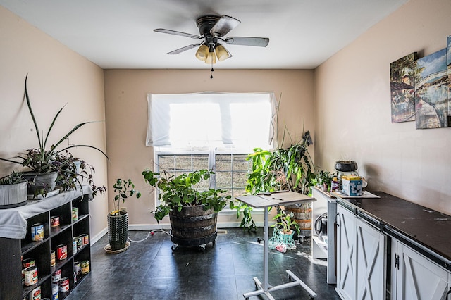 interior space featuring ceiling fan