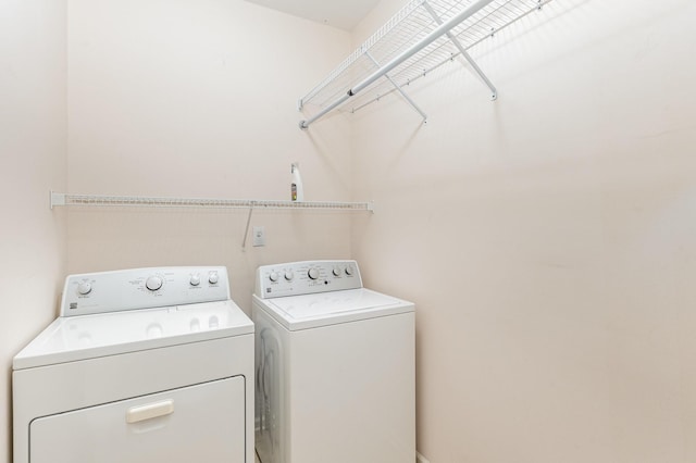 laundry area featuring separate washer and dryer