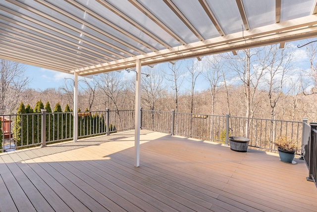 wooden terrace with a pergola