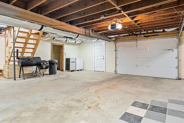 garage featuring a garage door opener