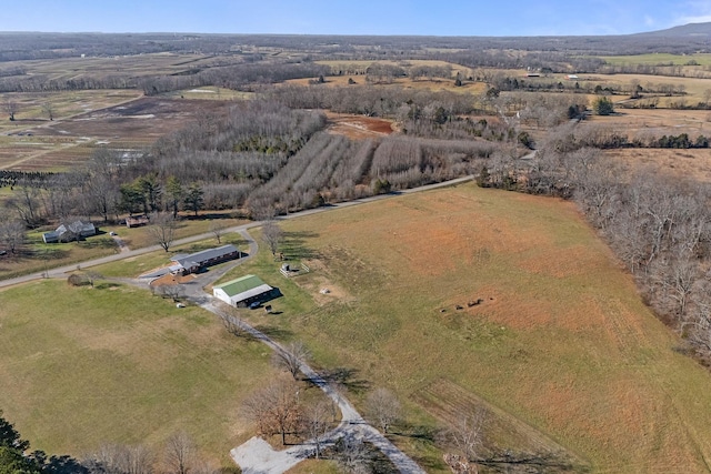 birds eye view of property featuring a rural view