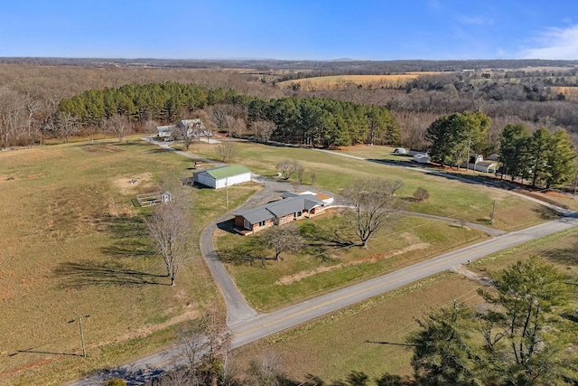 birds eye view of property with a rural view