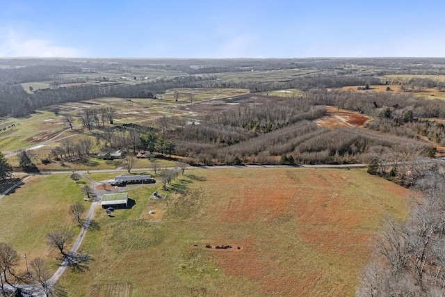 birds eye view of property featuring a rural view