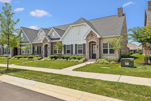 craftsman house with a front yard