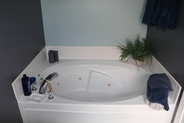 bathroom with a tub