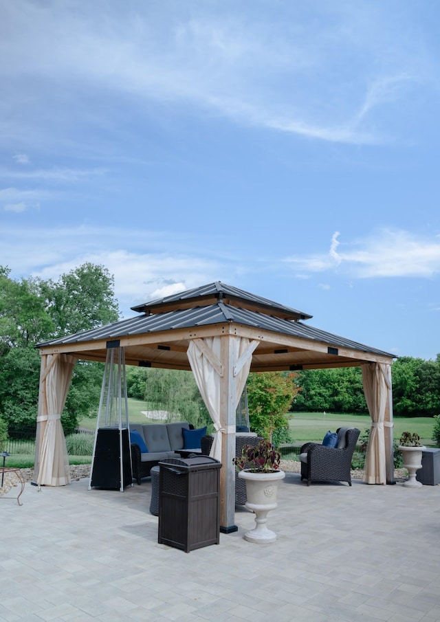 view of patio / terrace featuring a gazebo and an outdoor hangout area