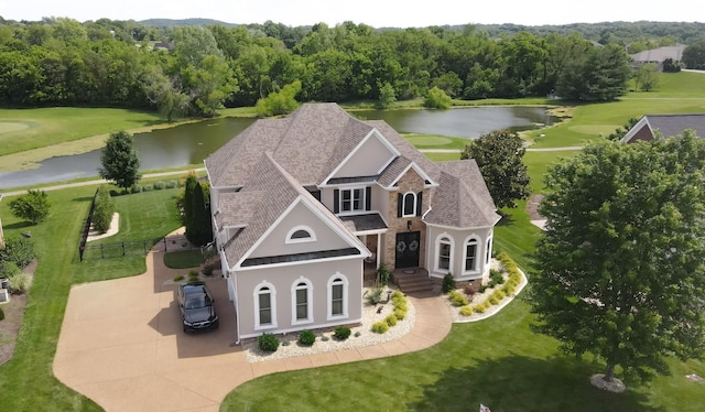 drone / aerial view featuring a water view