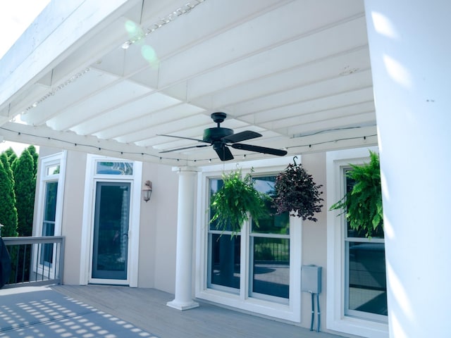 view of patio featuring ceiling fan and a deck