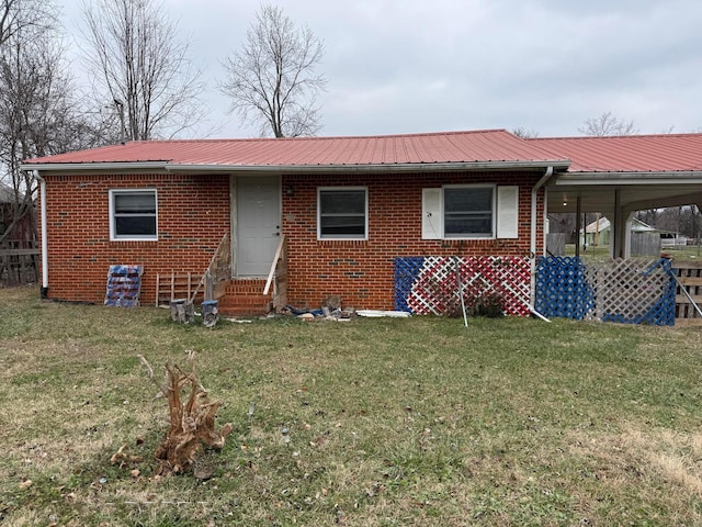 single story home with a front yard