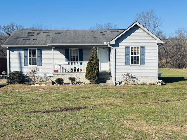 view of front of house featuring covered porch and a front lawn