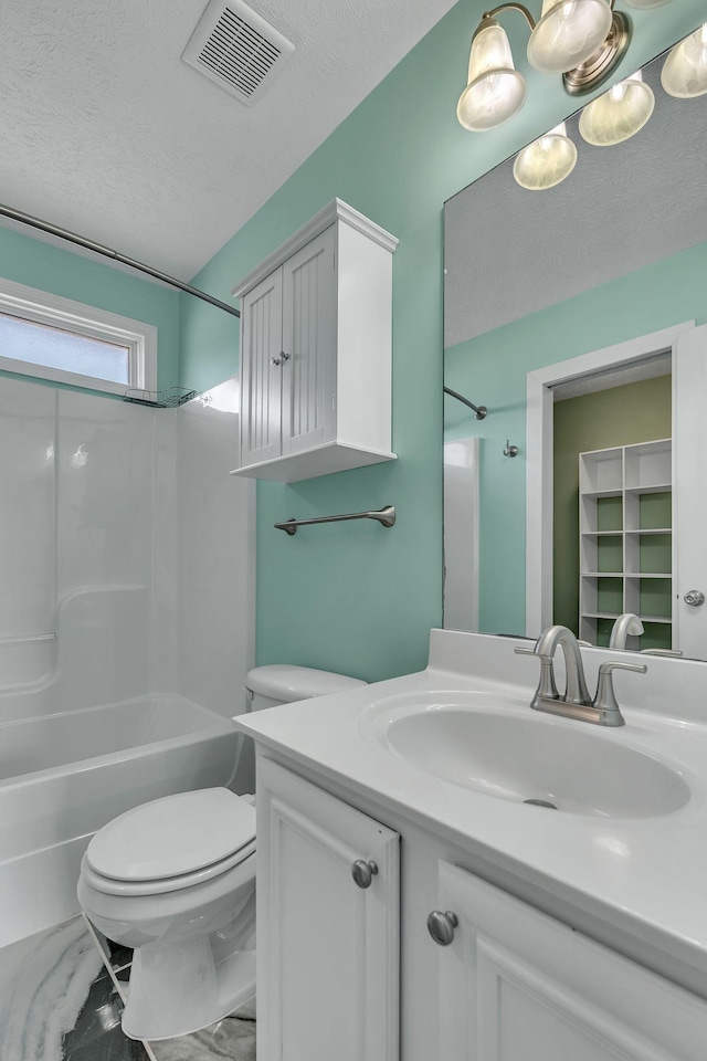 full bathroom with visible vents, a textured ceiling, vanity, and toilet