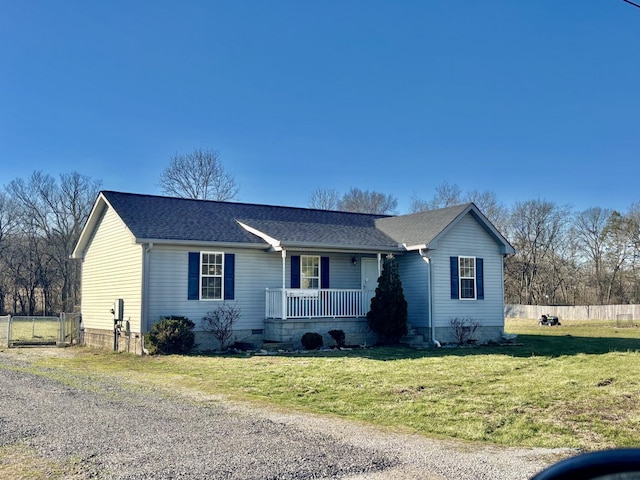 single story home with a front lawn, a gate, a porch, fence, and roof with shingles