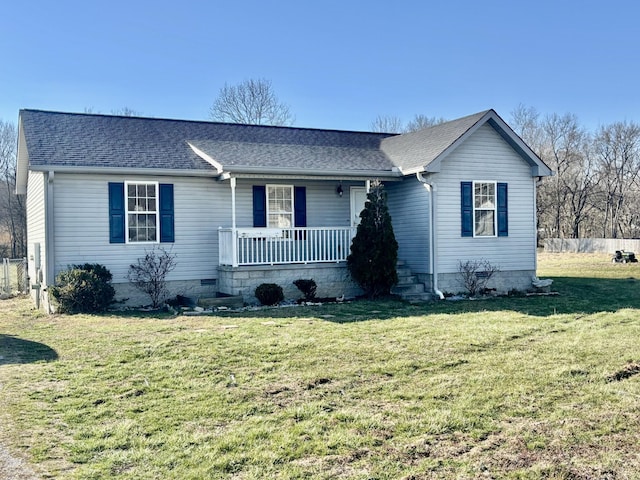 single story home with covered porch, a front yard, and fence