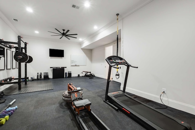 exercise room with ceiling fan and ornamental molding