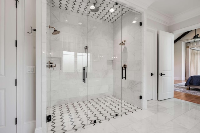 bathroom with walk in shower and ornamental molding