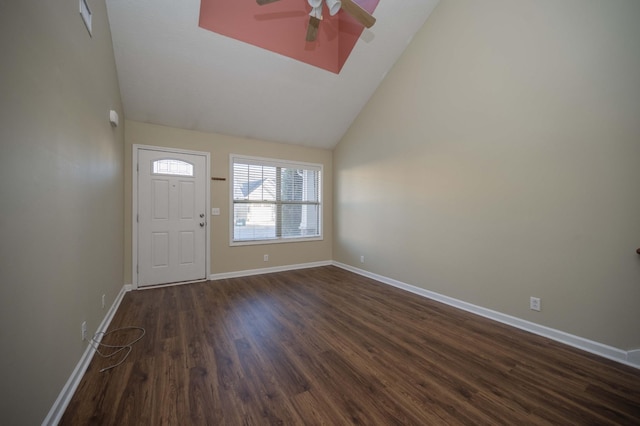 entrance foyer featuring dark hardwood / wood-style floors, ceiling fan, and high vaulted ceiling