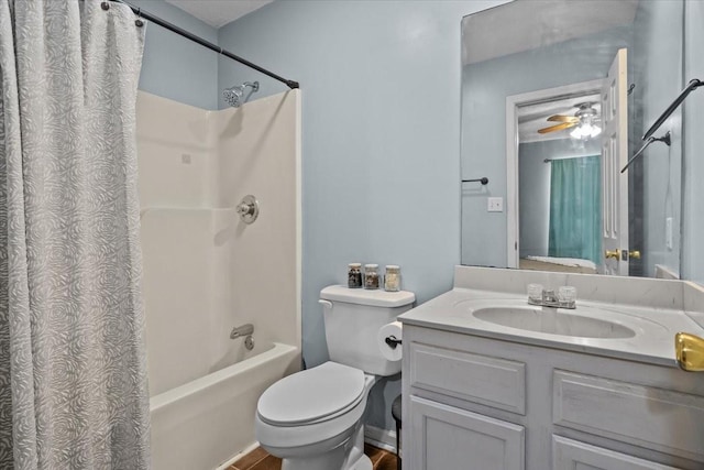 full bathroom with toilet, vanity, ceiling fan, and shower / bath combination with curtain