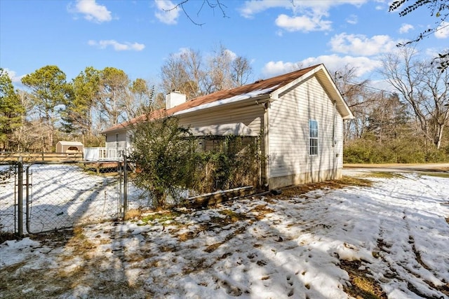 view of snow covered property