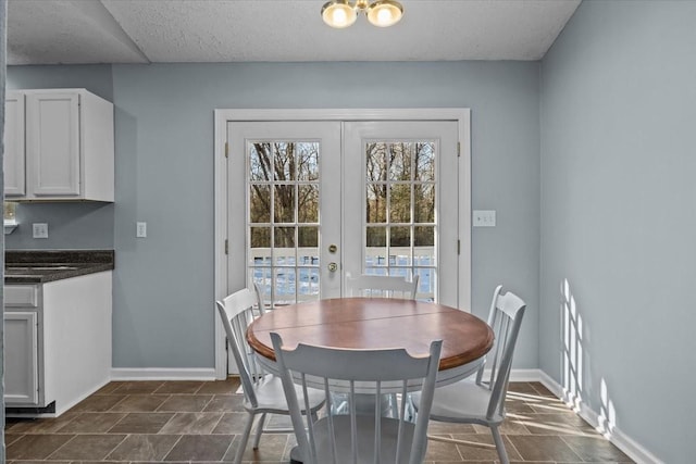 dining area featuring french doors