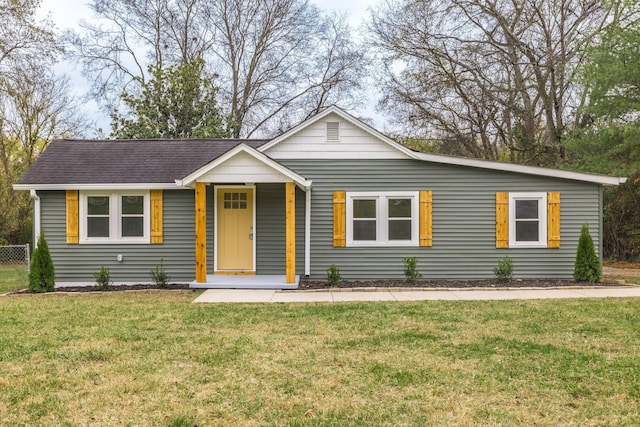 ranch-style house with a front yard