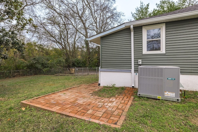 view of yard featuring central AC and a patio area