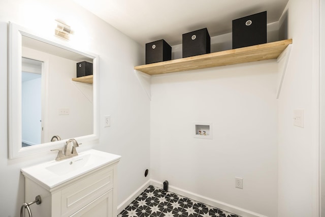 laundry room featuring sink and washer hookup