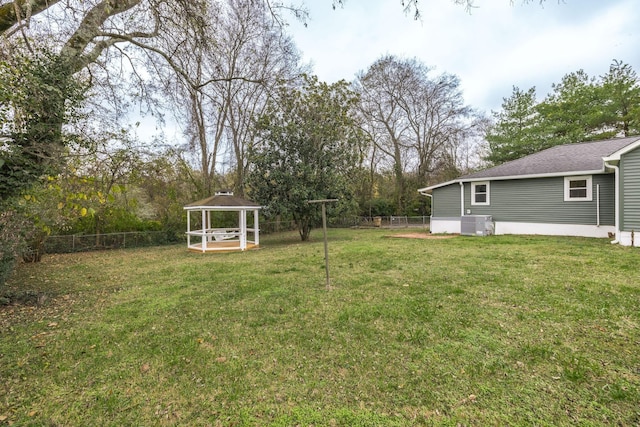 view of yard featuring a gazebo and cooling unit