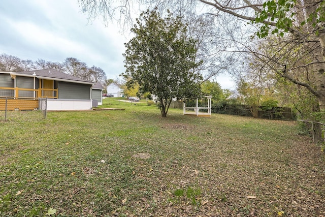 view of yard featuring a deck