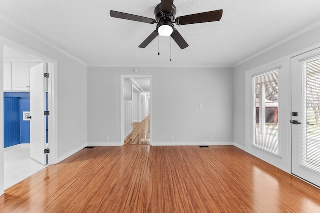 unfurnished living room with french doors, light hardwood / wood-style flooring, ceiling fan, and crown molding