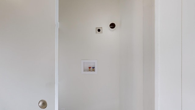 laundry room featuring washer hookup and electric dryer hookup