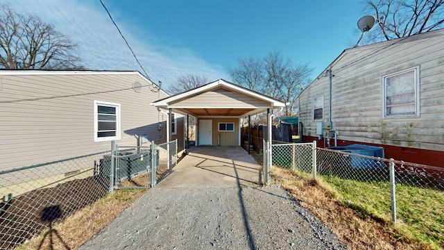 view of front of home with a carport