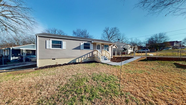 view of front of house featuring a front yard