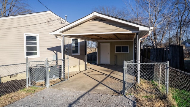 view of front of property with a carport