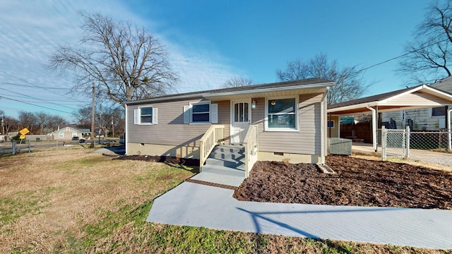 view of front of home with a front lawn