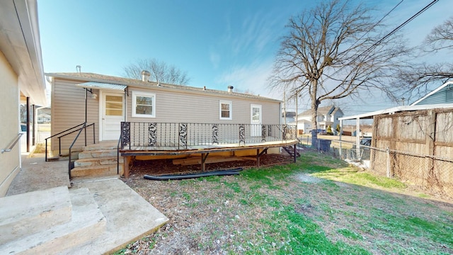 rear view of house with a deck